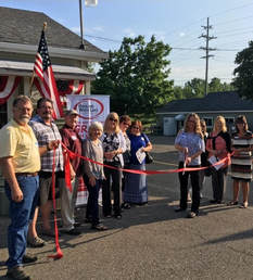 Ribbon cutting presented to Freedom Treasures Resale Store in Highland by the Highland White Lake Business Association.