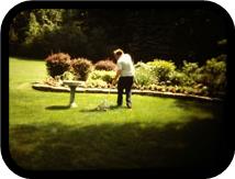 Photo from the 1980's of person served providing lawn maintenance..